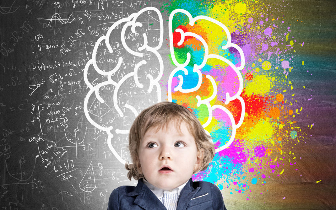 A boy in front of a chalkboard sketch of a colorful brain symbolizes hope for overcoming Adverse Childhood Experiences