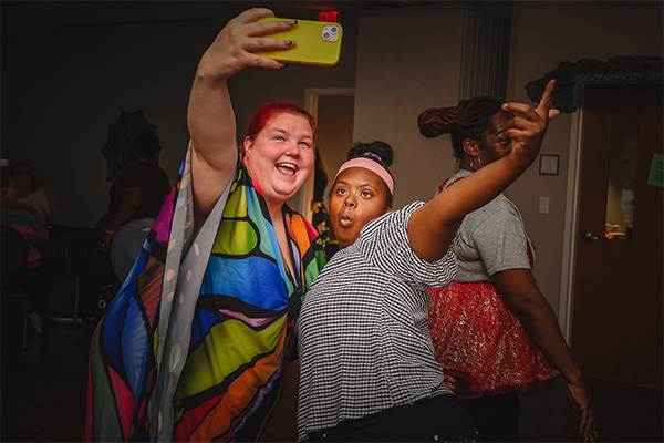 Two adults take a selfie