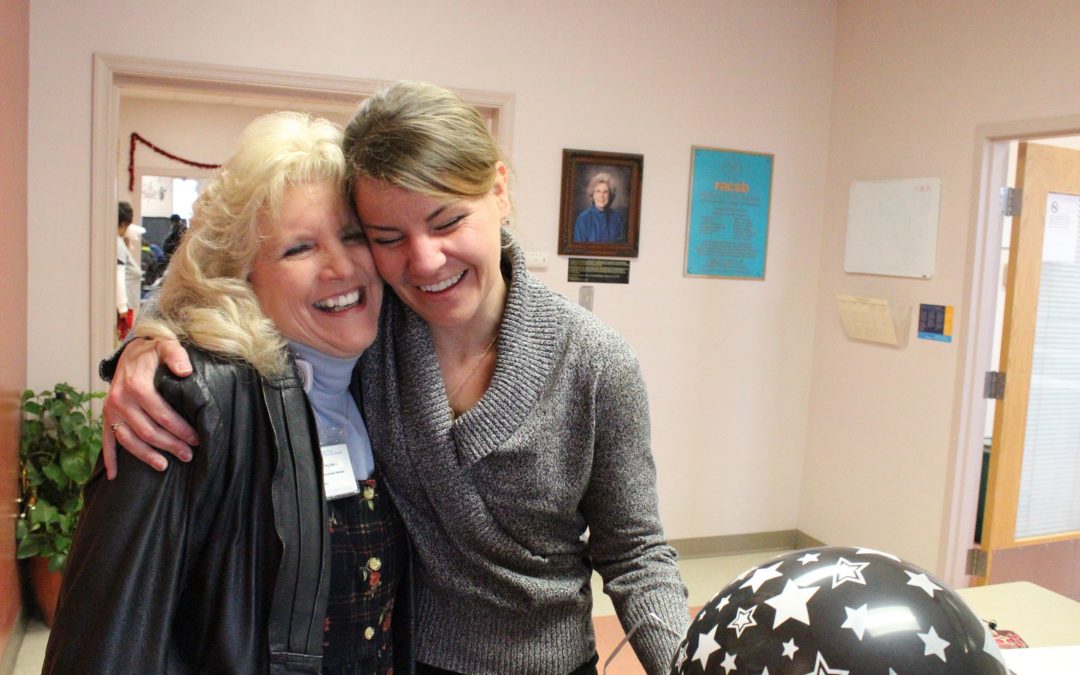 The accreditation mentioned caring and compassionate employees, like these two women