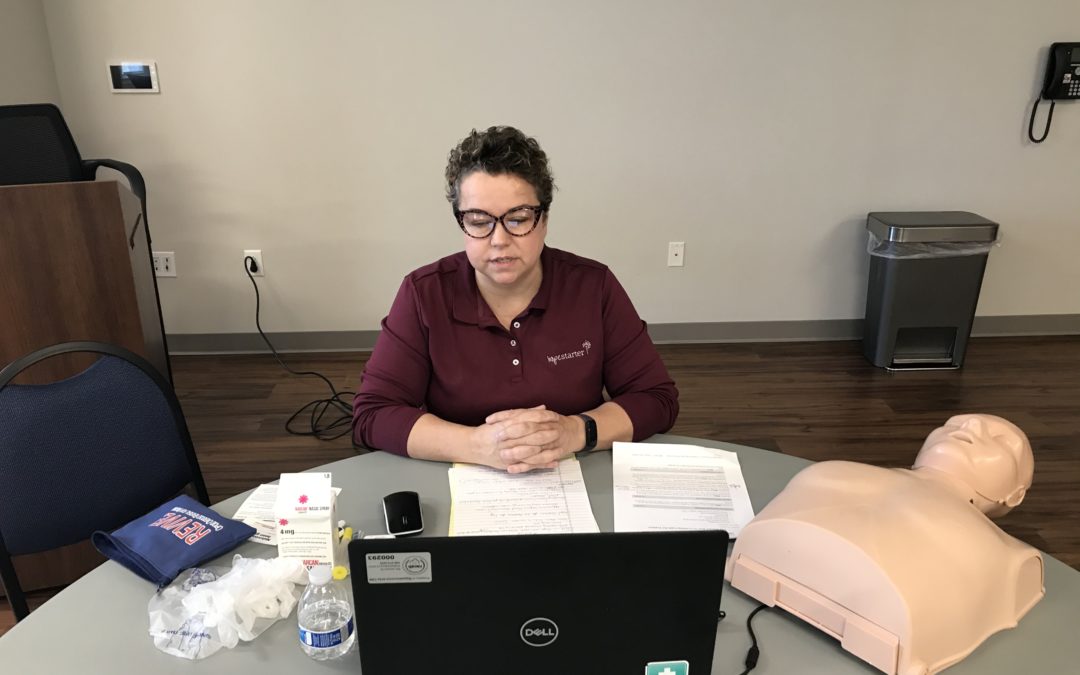 Instructor leading online virtual training on how to reduce opioid overdoses