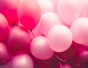 Group of red and pink balloons